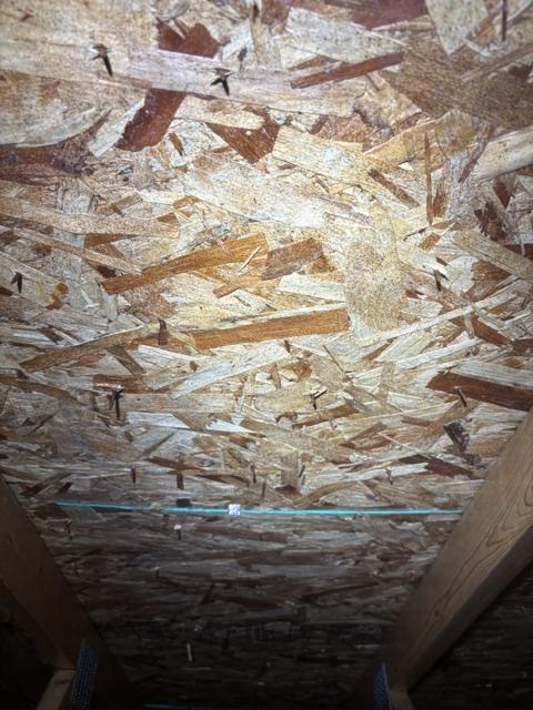Close-up of wood sheathing after mold remediation